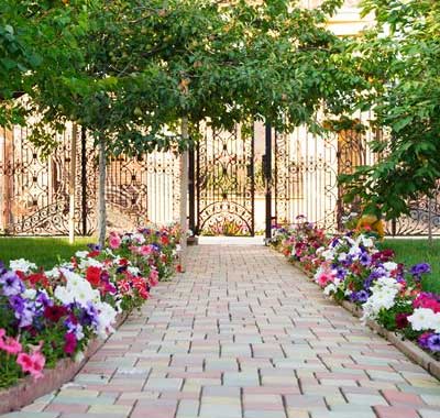Brick Pavers With Landscaped Flower Beds